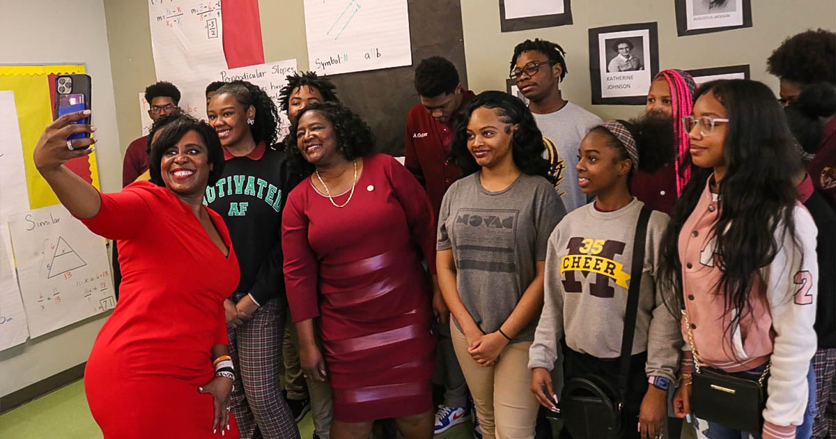 McDonogh 35 students and faculty take a photo